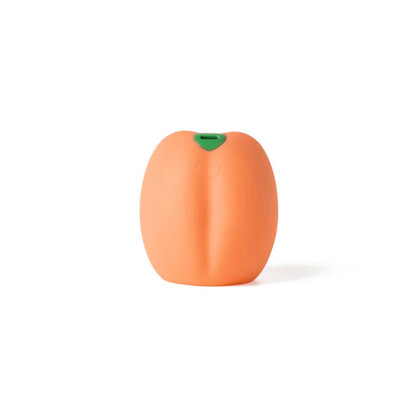 Peach vibrerende penissleeve fra Emojibator set fra en anden vinkel