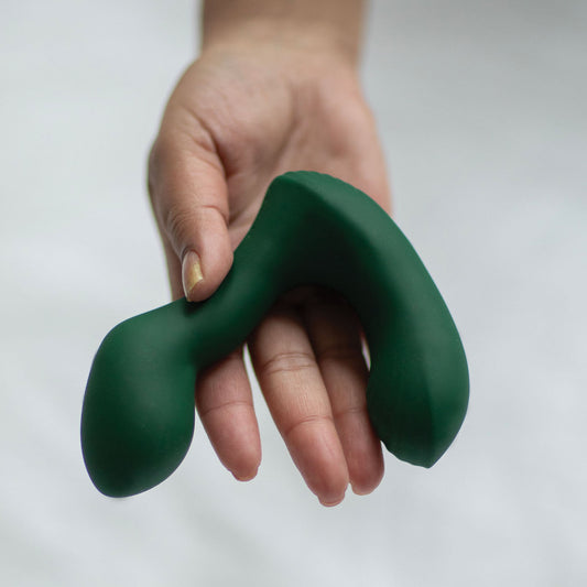 Birch peech vibrerende prostata massage apparat i hånd