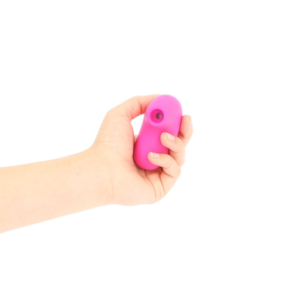 Handy fra peech - lille klitoris vakuum stimulator i hånd fra fronten
