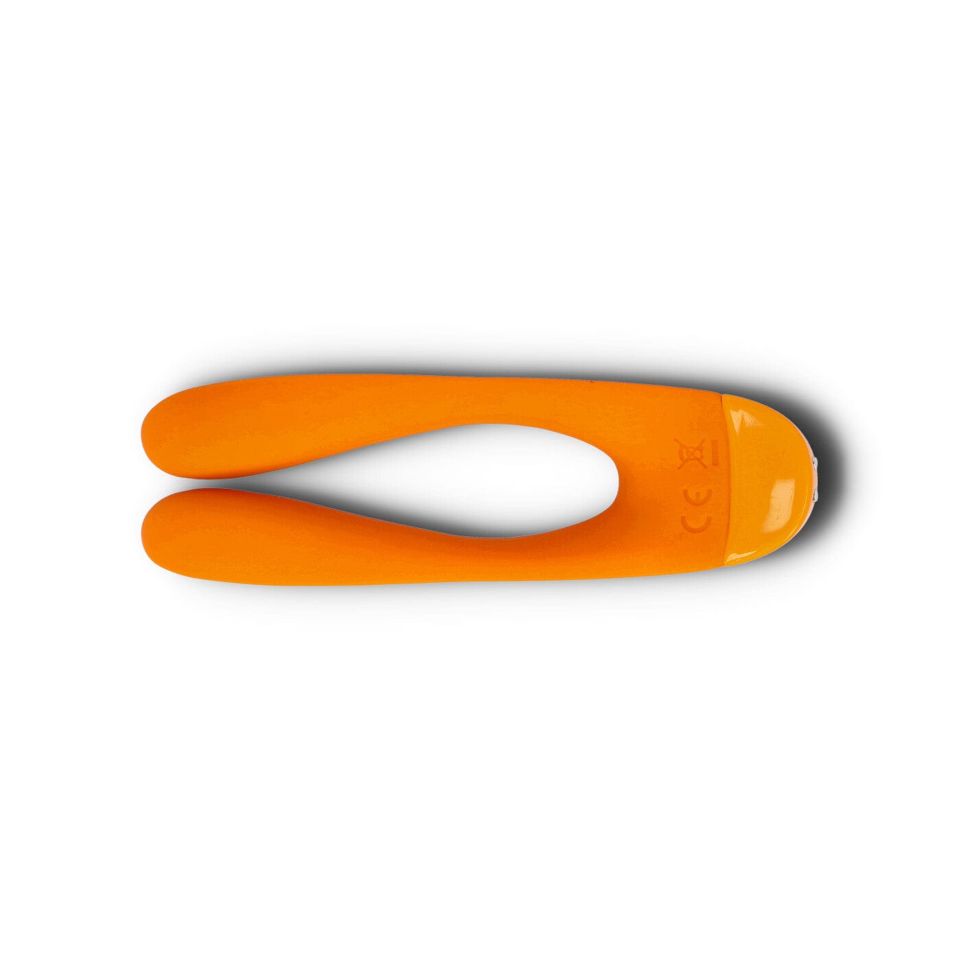 orange candy cane fingervibrator fra satisfyer liggende